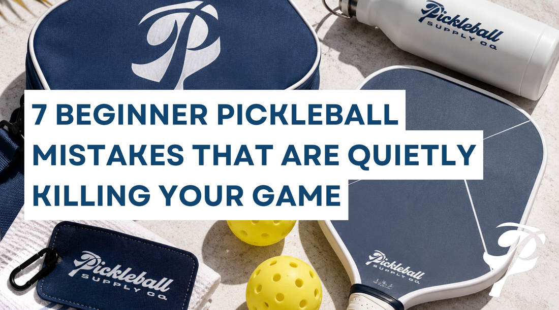 Pickleball paddle and balls arranged on a court surface